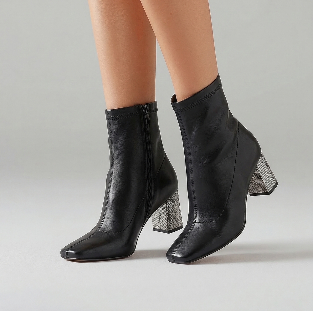 Elegant Black Heeled Boots with Silver Detail